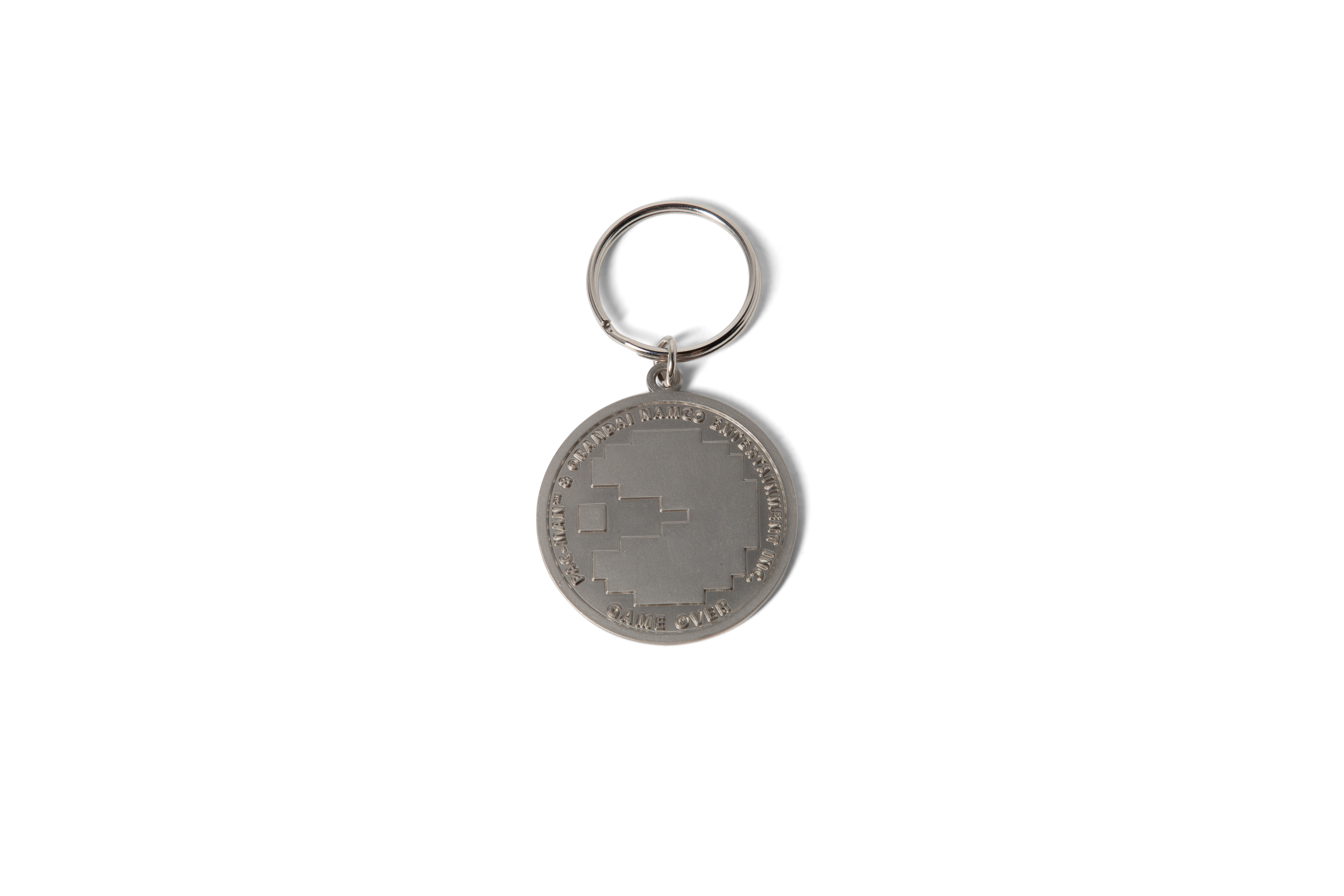 Girl Pac-Man Token Keychain Silver 4.png